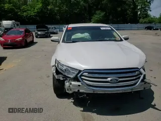 2015 Ford Taurus SEL z VIN 1FAHP2E82FG108442, wystawiony jako Copart lot #57790515 z przebiegiem 116 834 mil mil oraz Szkoda całkowita • Salvage title. Historia ofert i sprzedaży dostępna na DreamBid. Obrazek 13.