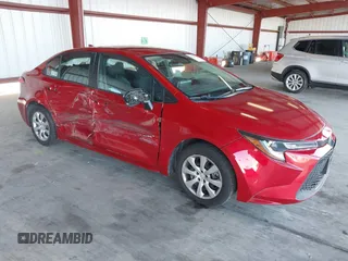 2021 Toyota Corolla LE with VIN 5YFEPMAE2MP171458, listed as a IAAI auction lot 40761520 with 74,588 mi miles. Bid and sale history available at carsss.com. Image 1.