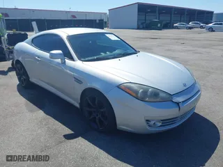 2008 Hyundai Tiburon GS with VIN KMHHM66D98U264256, listed as a IAAI auction lot 41755197 with 64,069 mi miles. Bid and sale history available at carsss.com. Image 1.
