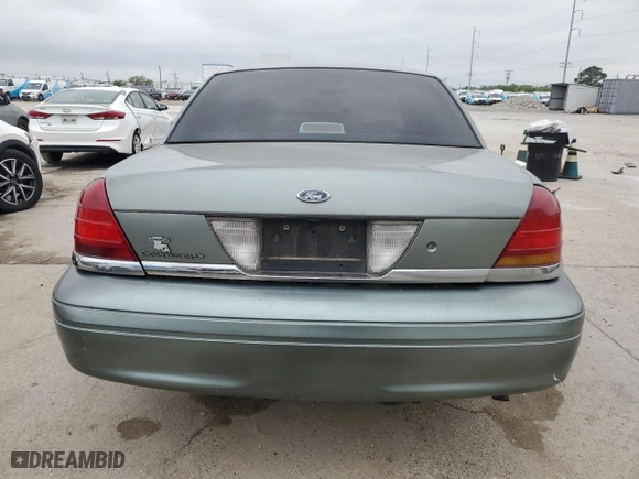2006 Ford Crown Victoria LX with VIN 2FAFP74W66X132385, listed as a Copart auction lot 50997775 with 214,277 mi miles and Salvage Title. Bid and sale history available at carsss.com. Image 6.