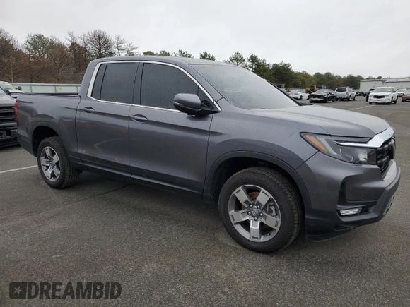 2024 Honda Ridgeline RTL with VIN 5FPYK3F54RB016029, listed as a Copart auction lot 82542864 with 6,745 mi miles and Salvage title. Bid and sale history available at DreamBid. Image 4.