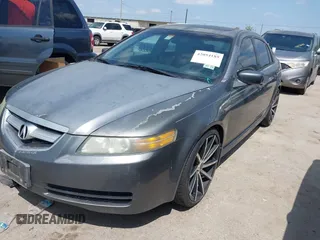 2005 Acura TL with VIN 19UUA66205A061121, listed as a IAAI auction lot 42054185 with 165,097 mi miles. Bid and sale history available at carsss.com. Image 2.