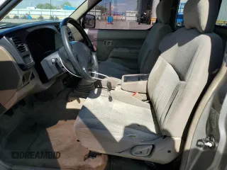 2000 Nissan Frontier XE with VIN 1N6DD26S7YC430643, listed as a Copart auction lot 59386765 with 204,851 mi miles and Salvage title. Bid and sale history available at DreamBid. Image 7.
