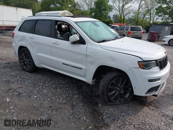 2018 Jeep Grand Cherokee High Altitude z VIN 1C4RJECG0JC223424, wystawiony jako IAAI lot #42116920 z przebiegiem 122 884 mil mil oraz . Historia ofert i sprzedaży dostępna na DreamBid. Obrazek 1.