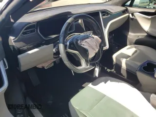 2016 Tesla Model S 90D z VIN 5YJSA1E4XGF115997, wystawiony jako Copart lot #60933525 z przebiegiem Nie podano mil oraz Szkoda całkowita • Salvage title. Historia ofert i sprzedaży dostępna na DreamBid. Obrazek 8.