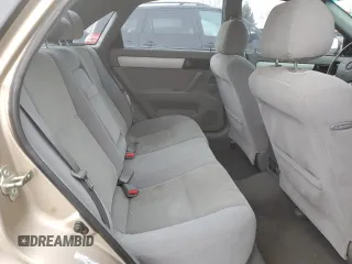 2007 Suzuki Forenza z VIN KL5JD56Z07K657218, wystawiony jako Copart lot #86767854 z przebiegiem 93 044 mil mil oraz Szkoda całkowita • Salvage title. Historia ofert i sprzedaży dostępna na DreamBid. Obrazek 10.