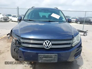 2015 Volkswagen Tiguan SE with VIN WVGAV7AX1FW508313, listed as a IAAI auction lot 42120704 with 136,405 mi miles and . Bid and sale history available at DreamBid. Image 12.