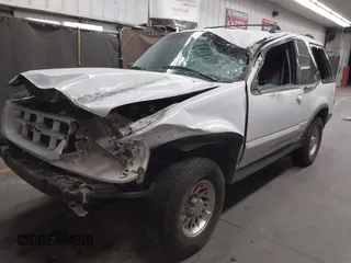 2000 Ford Explorer z VIN 1FMYU60XXYUA34664, wystawiony jako IAAI lot #41980401 z przebiegiem 179 946 mil mil oraz . Historia ofert i sprzedaży dostępna na DreamBid. Obrazek 17.