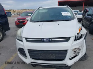 2015 Ford Escape SE with VIN 1FMCU0GX2FUB33893, listed as a IAAI auction lot 41455605 with 128,383 mi miles. Bid and sale history available at carsss.com. Image 18.