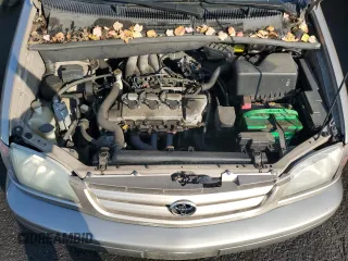 2002 Toyota Sienna LE with VIN 4T3ZF13C52U458553, listed as a Copart auction lot 77957754 with 164,058 mi miles and Salvage Title. Bid and sale history available at carsss.com. Image 12.
