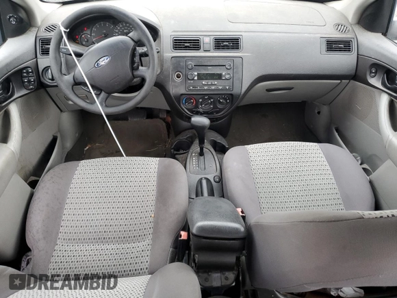 2007 Ford Focus S z VIN 1FAHP34N27W144992, wystawiony jako Copart lot #65571385 z przebiegiem 194 933 mil mil oraz Szkoda całkowita • Salvage title. Historia ofert i sprzedaży dostępna na DreamBid. Obrazek 8.