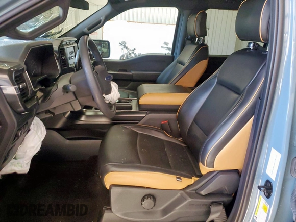 2023 Ford F-150 XL with VIN 1FTEW1CP7PKD02399, listed as a Copart auction lot 60738155 with 23,059 mi miles and Salvage title. Bid and sale history available at DreamBid. Image 7.
