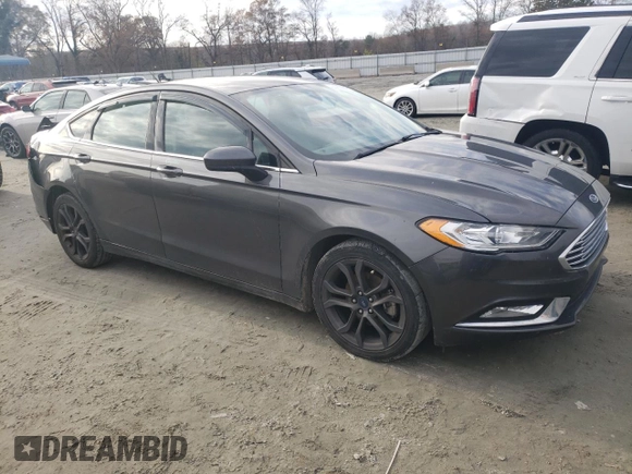 2018 Ford Fusion S z VIN 3FA6P0G70JR264965, wystawiony jako Copart lot #85553684 z przebiegiem 235 205 mil mil oraz Szkoda całkowita • Salvage title. Historia ofert i sprzedaży dostępna na DreamBid. Obrazek 4.