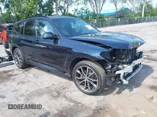 2021 BMW X3 sDrive30i z VIN 5UXTY3C00M9G70296, wystawiony jako IAAI lot #42295882 z przebiegiem 28 895 mil mil oraz . Historia ofert i sprzedaży dostępna na DreamBid. Obrazek 1.