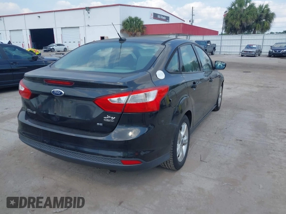2014 Ford Focus SE with VIN 1FADP3F22EL102502, listed as a IAAI auction lot 41969213 with 154,946 mi miles. Bid and sale history available at carsss.com. Image 4.