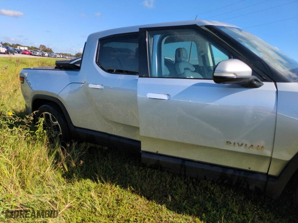 2023 Rivian R1T Adventure with VIN 7FCTGAAA5PN019317, listed as a Copart auction lot 74416784 with 11,508 mi miles and Salvage Title. Bid and sale history available at carsss.com. Image 3.