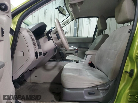 2012 Ford Escape XLT with VIN 1FMCU9D7XCKA07488, listed as a Copart auction lot 58605185 with 144,578 mi miles and Salvage title. Bid and sale history available at DreamBid. Image 7.