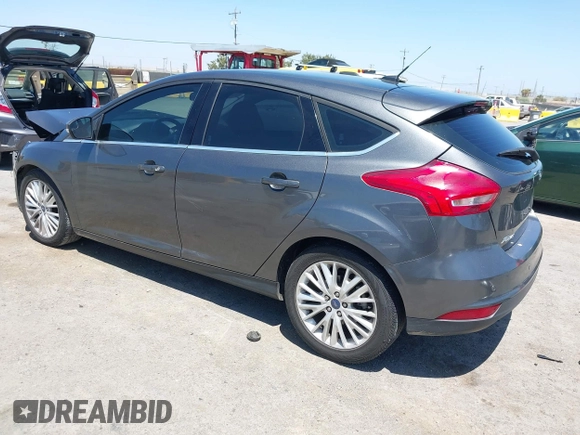 2018 Ford Focus Titanium with VIN 1FADP3N28JL232120, listed as a IAAI auction lot 42544070 with 28,661 mi miles and . Bid and sale history available at DreamBid. Image 3.