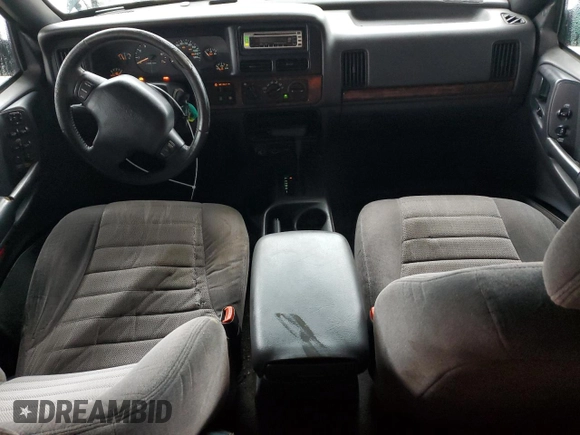 1997 Jeep Grand Cherokee TSi with VIN 1J4FX58S6VC602782, listed as a Copart auction lot 86605074 with 158,971 mi miles and Salvage Title. Bid and sale history available at carsss.com. Image 8.