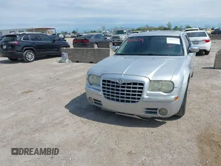 2005 Chrysler 300 with VIN 2C3JA63H05H693522, listed as a IAAI auction lot 41847279 with 162,037 mi miles. Bid and sale history available at carsss.com. Image 6.
