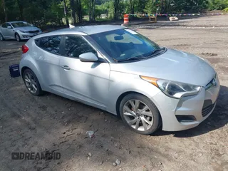 2016 Hyundai Veloster with VIN KMHTC6ADXGU277441, listed as a IAAI auction lot 42852858 with 132,958 mi miles and . Bid and sale history available at DreamBid. Image 1.