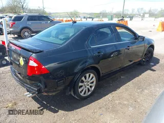 2011 Ford Fusion SE with VIN 3FAHP0HA6BR153888, listed as a IAAI auction lot 42009992 with 213,676 mi miles. Bid and sale history available at carsss.com. Image 4.