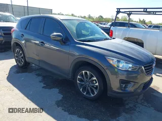 2016 Mazda CX-5 Grand Touring with VIN JM3KE2DYXG0784615, listed as a IAAI auction lot 41846853 with 72,185 mi miles. Bid and sale history available at carsss.com. Image 1.