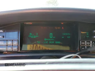 1995 Cadillac Concours z VIN 1G6KF52Y0SU301356, wystawiony jako Copart lot #77372694 z przebiegiem 132 934 mil mil oraz Szkody całkowita. Historia ofert i sprzedaży dostępna na DreamBid. Obrazek 9.