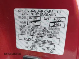 1997 Jaguar XK with VIN SAJGX2743VC017588, listed as a IAAI auction lot 42055716 with 66,052 mi miles and . Bid and sale history available at DreamBid. Image 9.