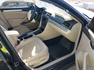 2019 Volkswagen Passat 2.0T Wolfsburg Edition with VIN 1VWLA7A32KC012841, listed as a IAAI auction lot 41539683 with 75,897 mi miles. Bid and sale history available at carsss.com. Image 5.