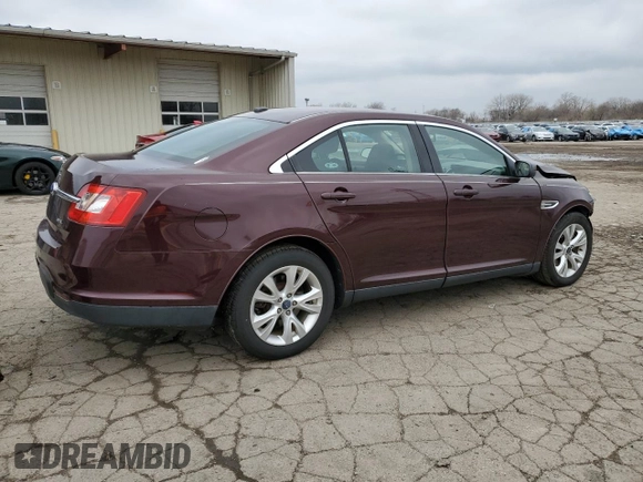 2011 Ford Taurus SEL z VIN 1FAHP2EW4BG167369, wystawiony jako Copart lot #52797525 z przebiegiem 98 696 mil mil oraz Czysty tytuł • Clean title. Historia ofert i sprzedaży dostępna na DreamBid. Obrazek 3.