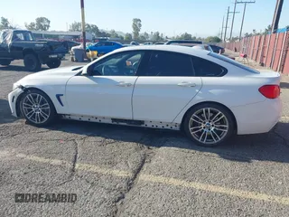2016 BMW 4 Series 428i with VIN WBA4A9C56GGL88280, listed as a IAAI auction lot 41934868 with 166,720 mi miles and . Bid and sale history available at carsss.com. Image 14.