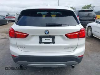 2018 BMW X1 sDrive28i with VIN WBXHU7C38J5L05985, listed as a IAAI auction lot 42014649 with 77,082 mi miles. Bid and sale history available at carsss.com. Image 17.