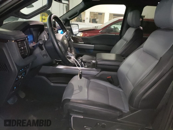 2022 Ford F-150 Lightning Pro z VIN 1FT6W1EV7NWG10033, wystawiony jako Copart lot #81516533 z przebiegiem 11 282 mil mil oraz Szkody całkowita. Historia ofert i sprzedaży dostępna na DreamBid. Obrazek 7.