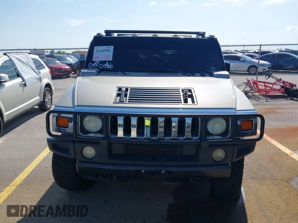 2003 Hummer H2 with VIN 5GRGN23U43H125114, listed as a IAAI auction lot 42160986 with 157,776 mi miles. Bid and sale history available at carsss.com. Image 12.