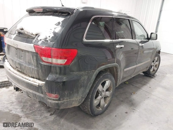 2011 Jeep Grand Cherokee Overland Summit with VIN 1J4RR6GT5BC702214, listed as a IAAI auction lot 41368605 with 183,068 mi miles. Bid and sale history available at carsss.com. Image 4.