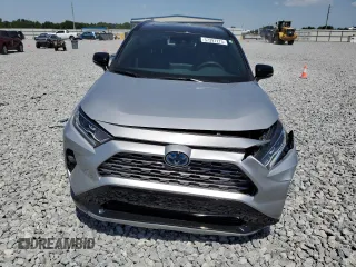 2021 Toyota RAV4 Hybrid XSE with VIN 2T3E6RFV4MW017302, listed as a Copart auction lot 57397275 with 15,544 mi miles and Salvage title. Bid and sale history available at DreamBid. Image 5.