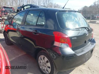 2010 Toyota Yaris with VIN JTDKT4K38A5318130, listed as a IAAI auction lot 41802640 with 196,330 mi miles. Bid and sale history available at carsss.com. Image 3.