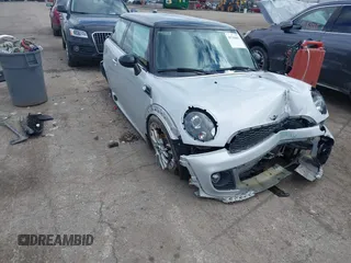 2013 MINI Cooper Hardtop with VIN WMWSU3C56DT374488, listed as a IAAI auction lot 41744603 with 82,678 mi miles. Bid and sale history available at carsss.com. Image 1.