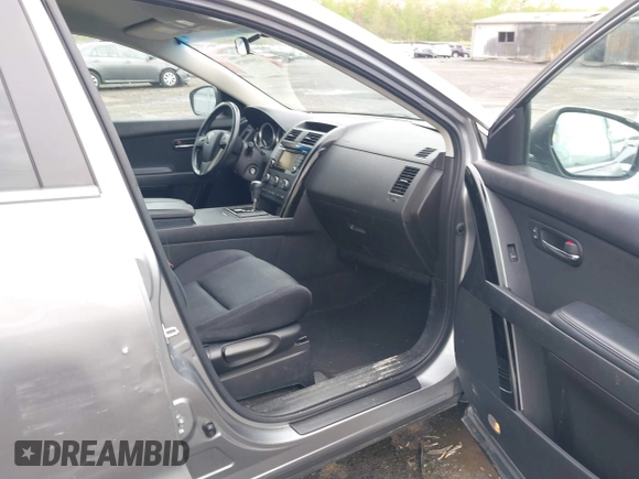 2015 Mazda CX-9 Sport with VIN JM3TB3BV2F0454770, listed as a IAAI auction lot 42009879 with 98,916 mi miles and . Bid and sale history available at carsss.com. Image 5.