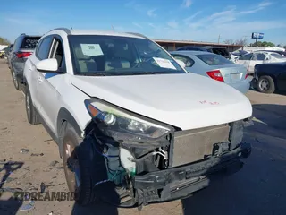 2016 Hyundai Tucson SE z VIN KM8J3CA48GU248042, wystawiony jako IAAI lot #41716128 z przebiegiem 92 886 mil mil oraz . Historia ofert i sprzedaży dostępna na DreamBid. Obrazek 1.
