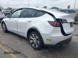 2023 Tesla Model Y Long Range with VIN 7SAYGAEE9PF702910, listed as a IAAI auction lot 42199519 with 91,094 mi miles and . Bid and sale history available at DreamBid. Image 3.