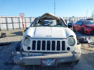 2005 Jeep Liberty Sport with VIN 1J4GK48KX5W679070, listed as a IAAI auction lot 41807899 with 157,726 mi miles. Bid and sale history available at carsss.com. Image 12.