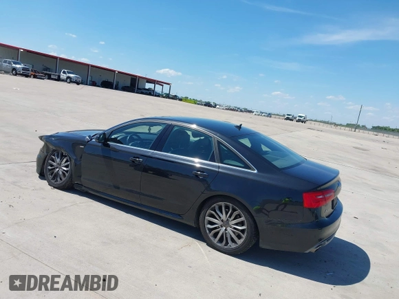 2014 Audi A6 Prestige with VIN WAUHMAFC8EN081609, listed as a IAAI auction lot 42252900 with 170,222 mi miles and . Bid and sale history available at DreamBid. Image 3.