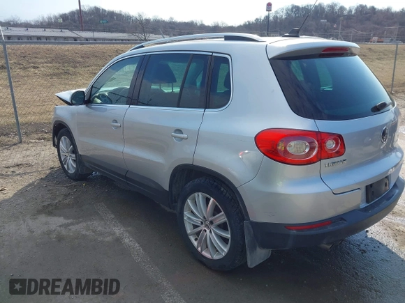 2011 Volkswagen Tiguan SE with VIN WVGBV7AX2BW562055, listed as a IAAI auction lot 41642084 with 175,407 mi miles and . Bid and sale history available at DreamBid. Image 3.