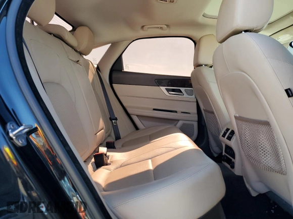 2018 Jaguar XF 25t Prestige with VIN SAJBE4FX9JCY64763, listed as a Copart auction lot 86058104 with 76,900 mi miles and Salvage Title. Bid and sale history available at carsss.com. Image 10.
