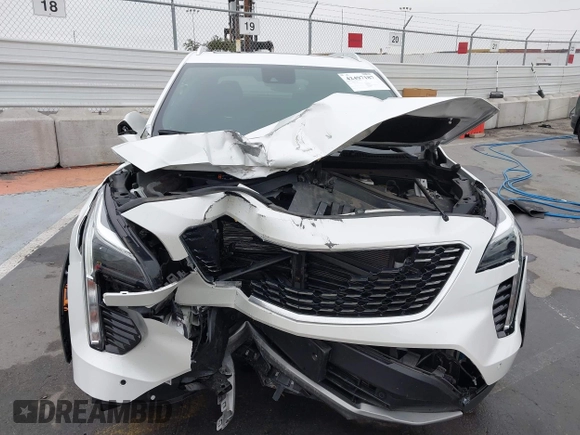 2022 Cadillac XT4 FWD Premium Luxury with VIN 1GYFZCR49NF100393, listed as a IAAI auction lot 42497187 with 23,672 mi miles and . Bid and sale history available at DreamBid. Image 6.