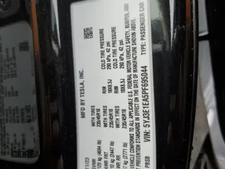 2023 Tesla Model 3 z VIN 5YJ3E1EA5PF695044, wystawiony jako Copart lot #45182665 z przebiegiem 21 104 mil mil oraz Szkoda całkowita • Salvage title. Historia ofert i sprzedaży dostępna na DreamBid. Obrazek 14.