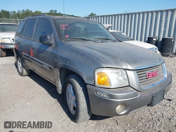 2005 GMC Envoy SLT with VIN 1GKDS13SX52175970, listed as a IAAI auction lot 42047871 with 205,432 mi miles. Bid and sale history available at carsss.com. Image 1.