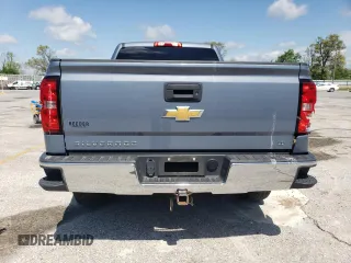 2015 Chevrolet Silverado 1500 LT with VIN 1GCVKREC7FZ435447, listed as a Copart auction lot 54519515 with 124,881 mi miles and Salvage Title. Bid and sale history available at DreamBid. Image 6.